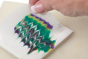 Cooled sheet being peeled from the ceramic tile